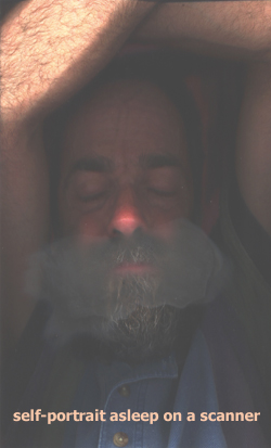 self-portrait asleep on a scanner